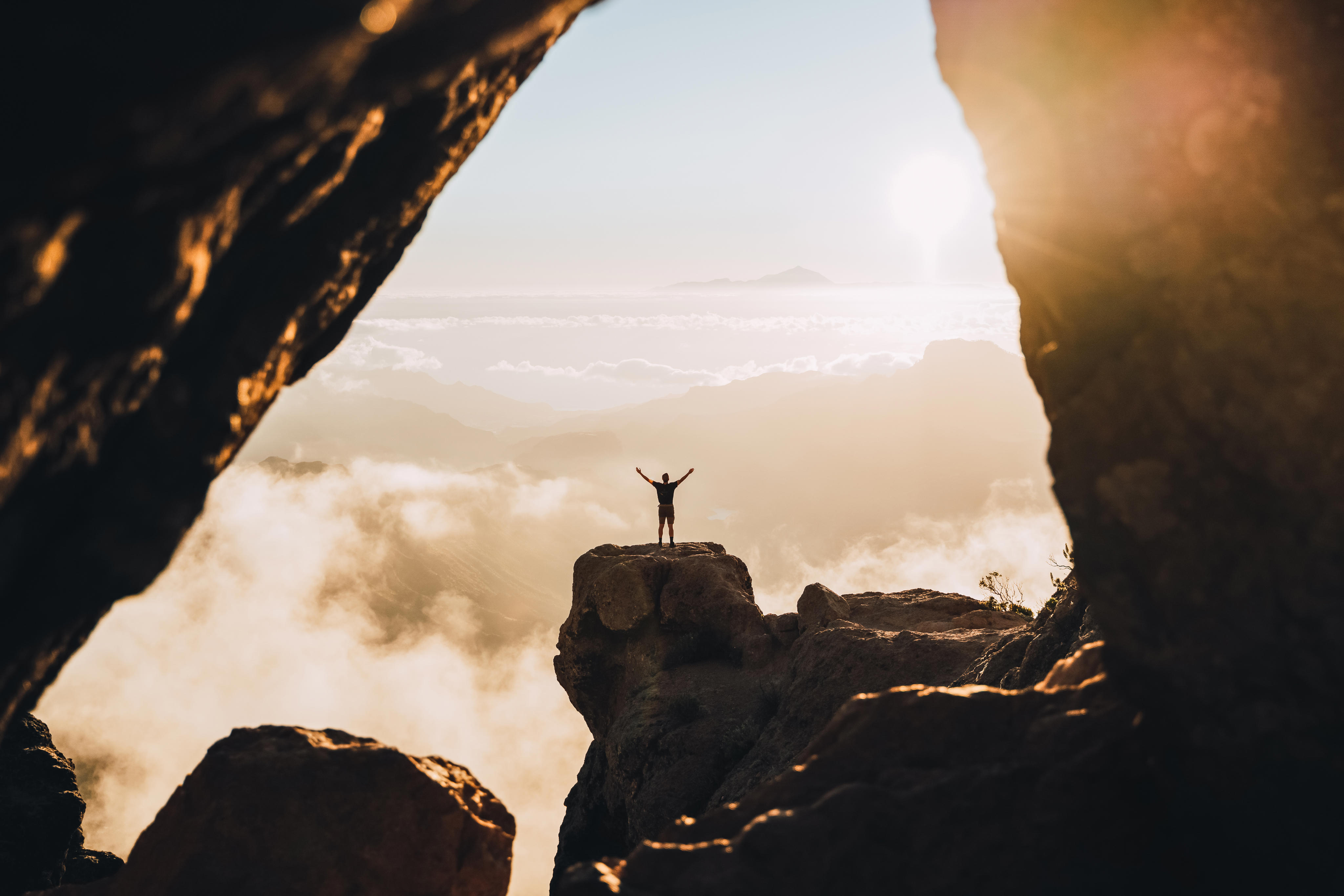 man standing on hill